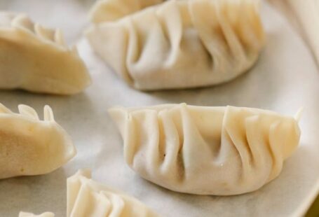 Local Cuisine - Traditional oriental dumplings in bamboo steamer