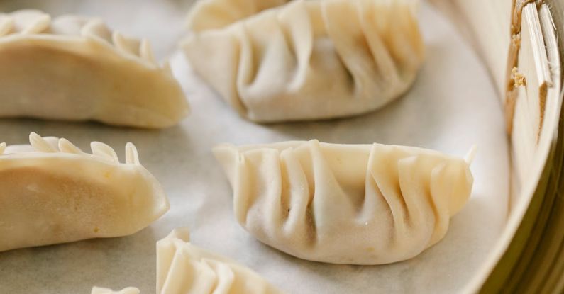 Local Cuisine - Traditional oriental dumplings in bamboo steamer