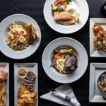 Feast-Worthy Meals - Foods on Plates over Black Surface