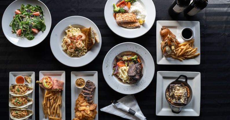 Feast-Worthy Meals - Foods on Plates over Black Surface