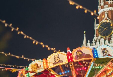Famous Festival Dishes - Colorful luminous carousel against Kremlin on Red Square at night