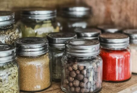 Culinary Traditions - Spice Bottles on Shelf