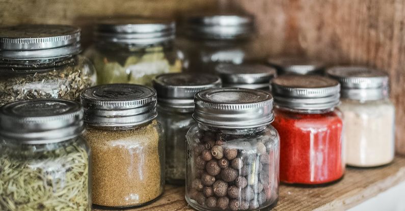 Culinary Traditions - Spice Bottles on Shelf