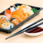 Asian Cooking Methods - Close-up Photo of Sushi Served on Table